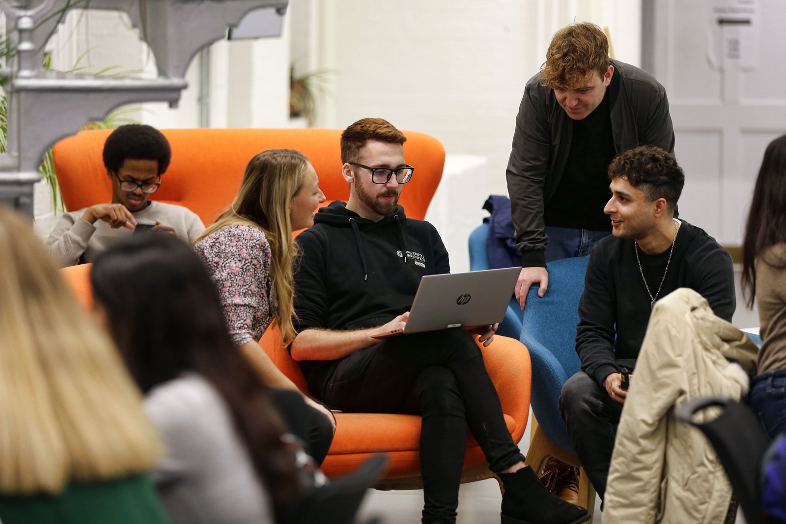 Ozzy and Marc working through a programme with a student
